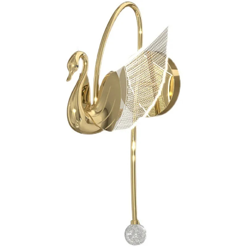 Modern gold swan-shaped wall lamp with acrylic shade mounted beside bed
