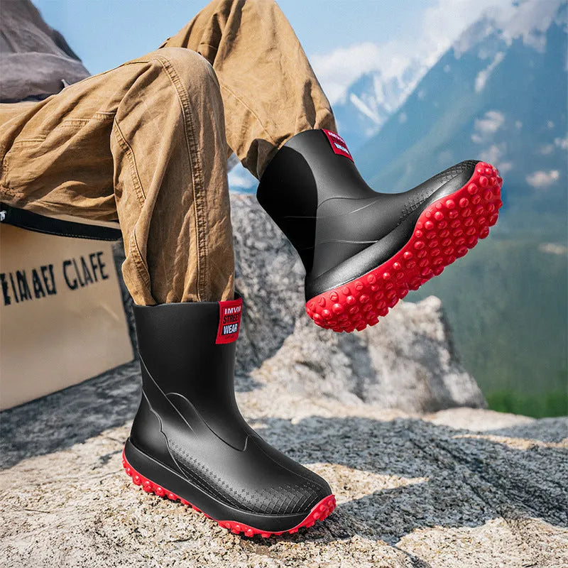 Men's mid low tube PVC rain boots in black, non-slip sole, flat heel, round toe