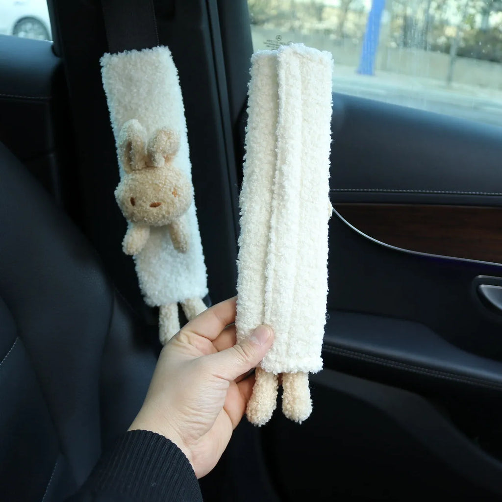 Cartoon plush car seatbelt shoulder protector in Rabbit and Bear designs made from soft lamb wool.