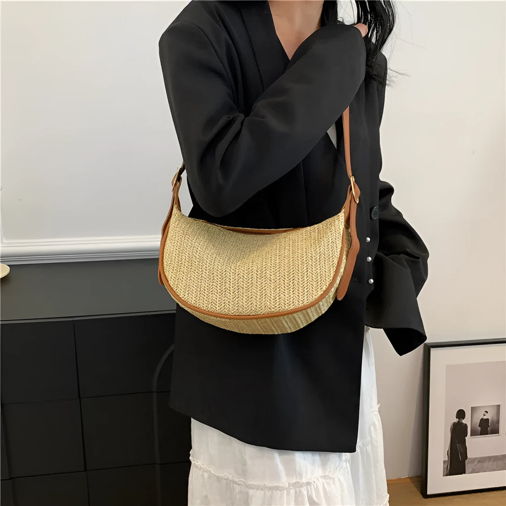 Women's straw woven crossbody bag with single strap and textured knitted appearance