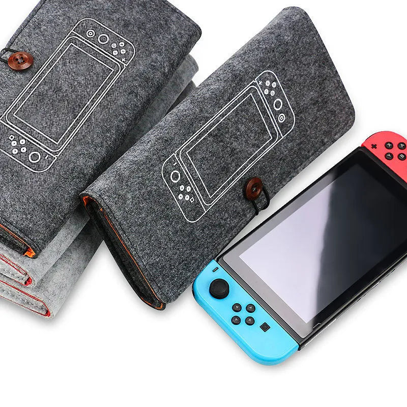 Black Nintendo Switch felt carrying pouch showing game card slots and dual compartments.