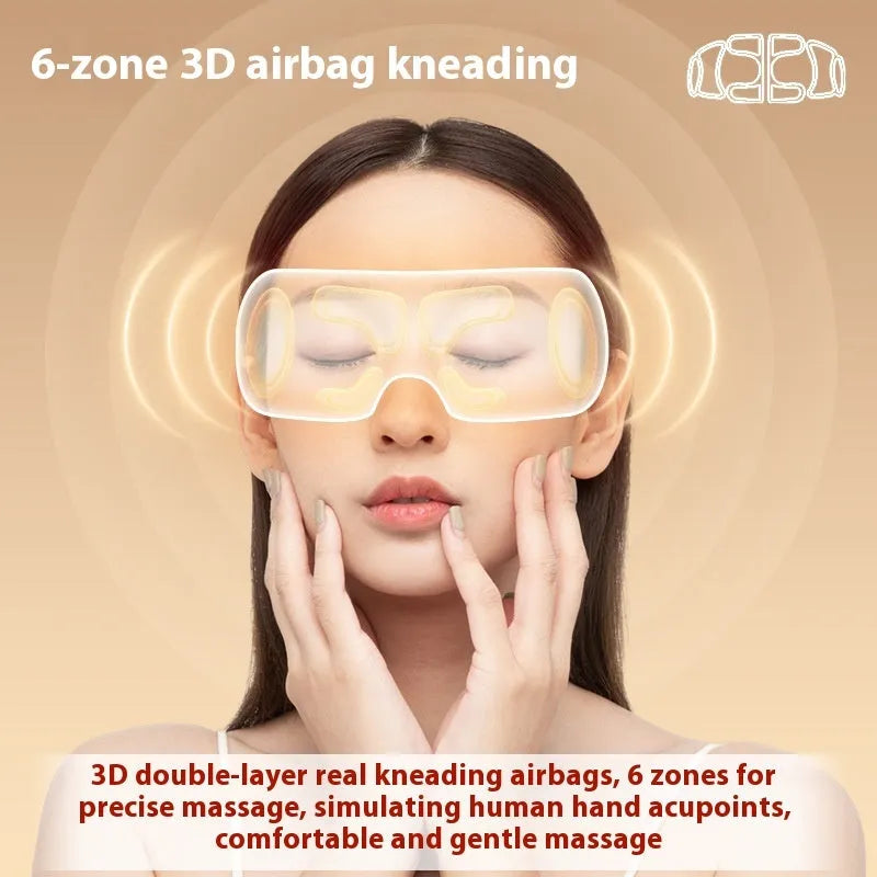 White rechargeable eye massager with hot compress function on a plain background