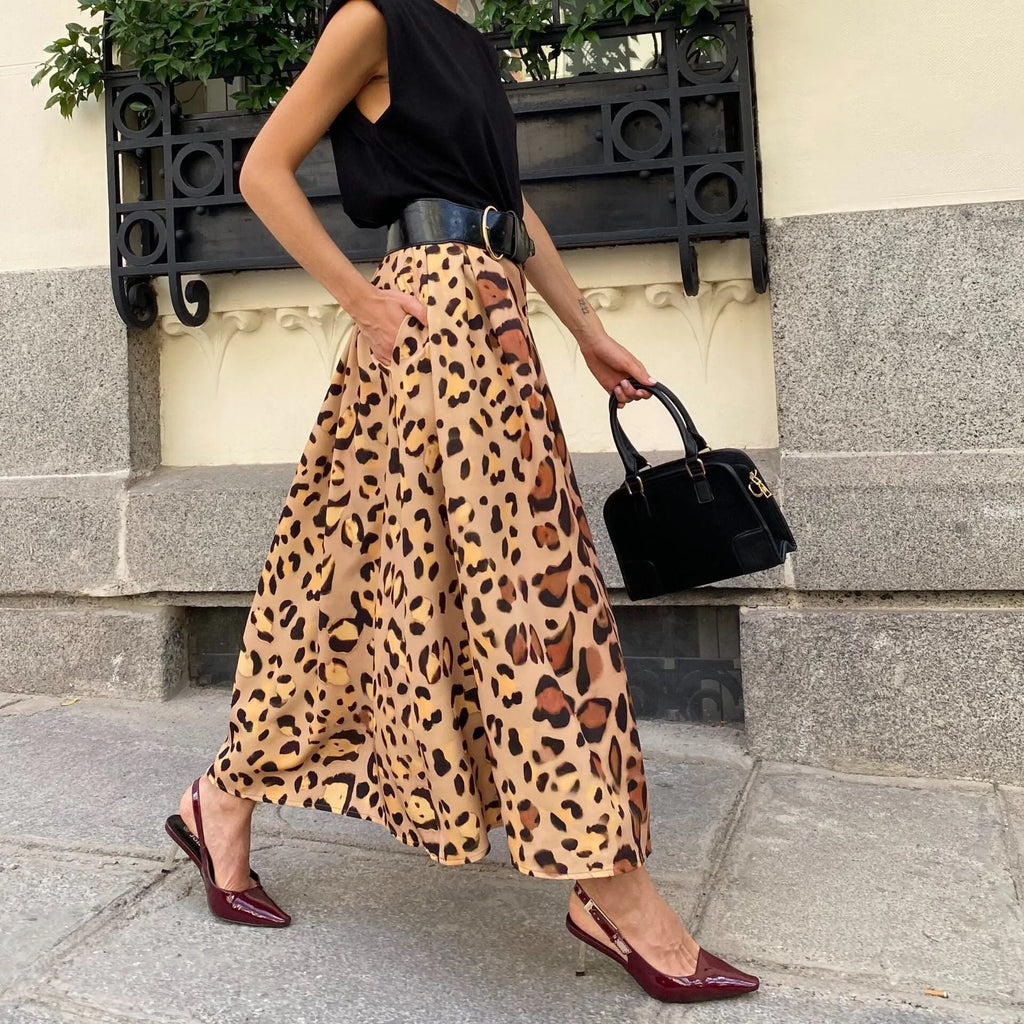 Brown leopard print women's A-line long skirt with big hem design on hanger