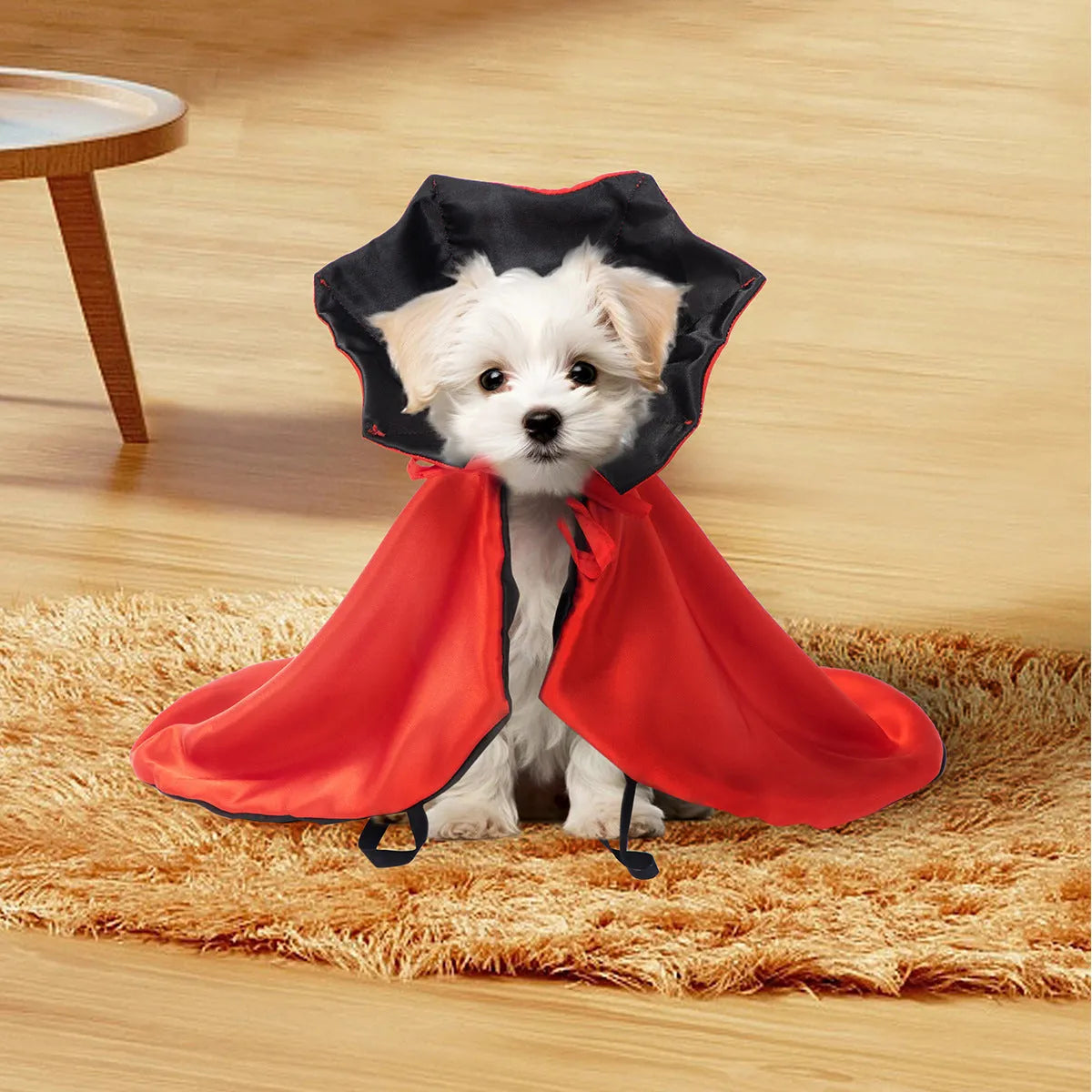 Red polyester Halloween atmosphere cloak for dogs and cats, laid flat showing open-back design
