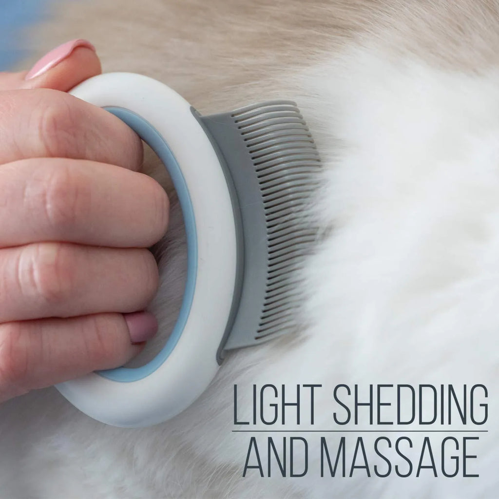 Blue plastic pet grooming comb for deshedding and dematting cat and dog hair.