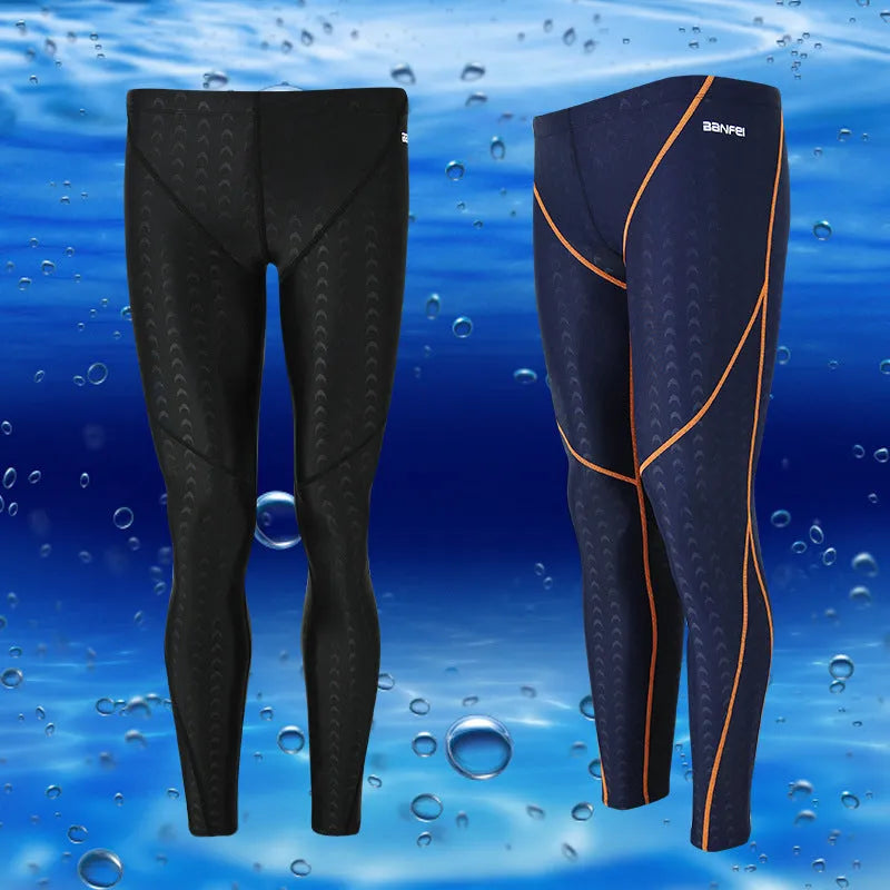 Men's nylon swimming trunks in black with grey trim, showing cropped brief style with mesh lining