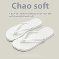 Foldable orange, purple, black, and white plastic beach slippers with non-slip PVC soles.