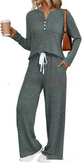 Women's knitted long coat and trouser set in a stripe pattern with V-neck and lace-up detail.