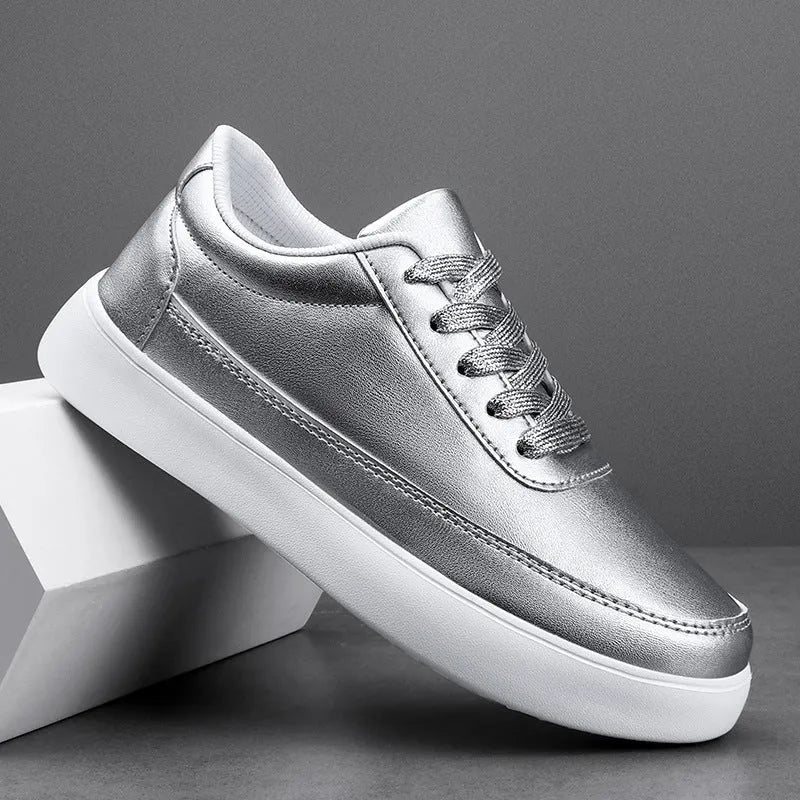 Women's white leather lace-up flat casual shoes shown from the side.