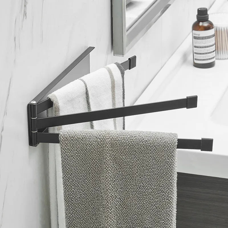 Nordic folding carbon steel towel bar in black mounted on bathroom wall
