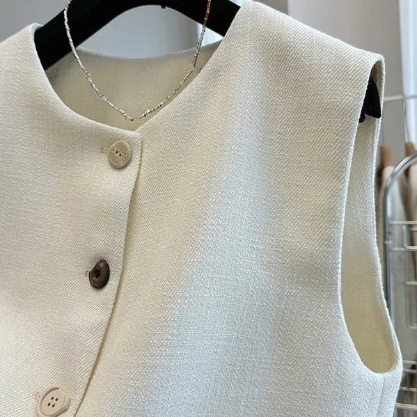 Round neck sleeveless vest with bandage dress styling in milky white colour French style temperament outerwear