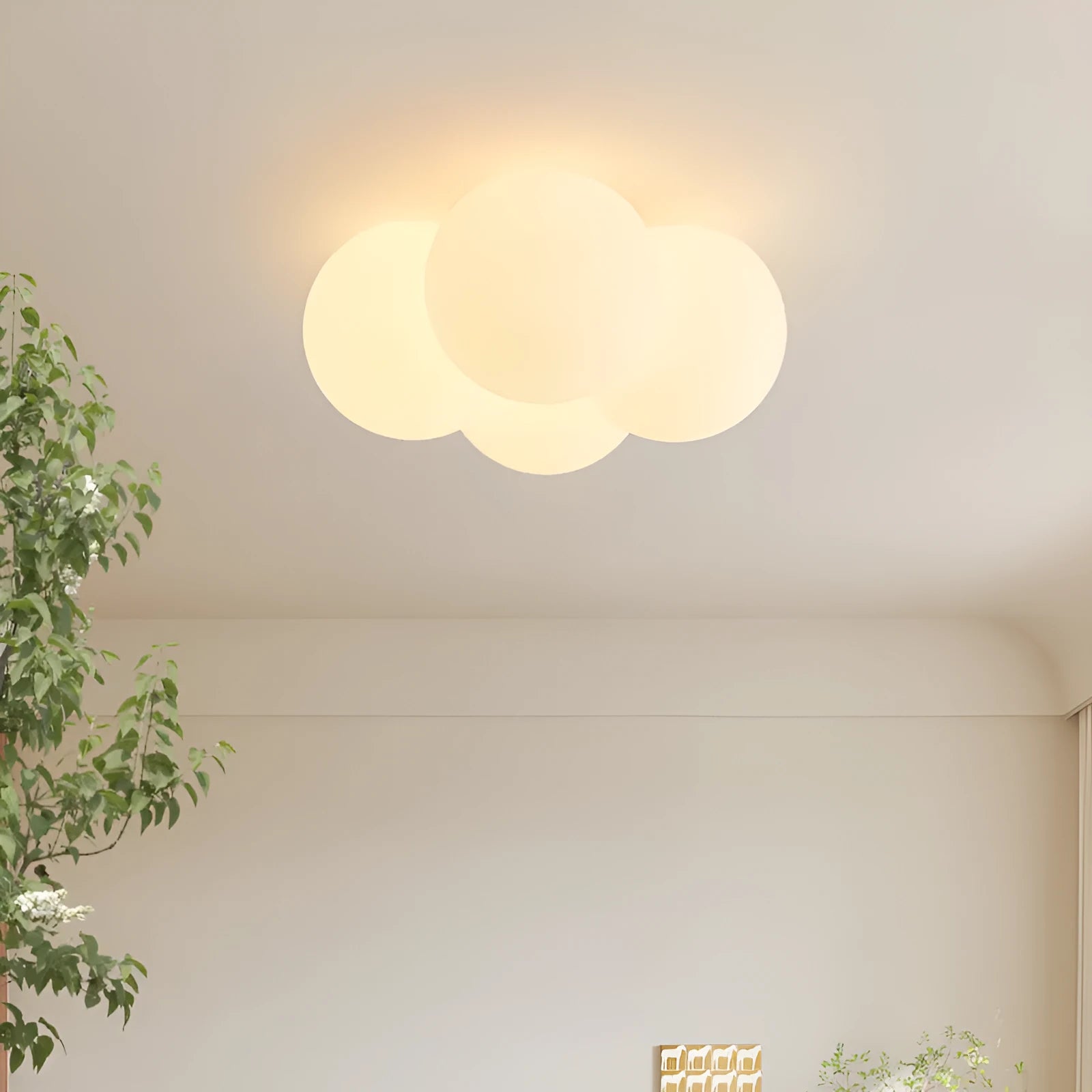 Modern minimalist cloud chandelier with tricolor light, 42mm diameter, ceiling mounted in a bedroom