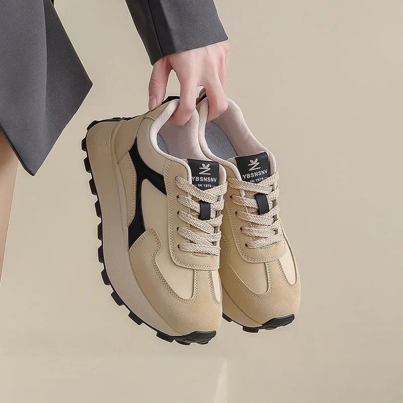 Women's low-top lace-up platform sneakers in three colours with a rubber sole and mesh lining.