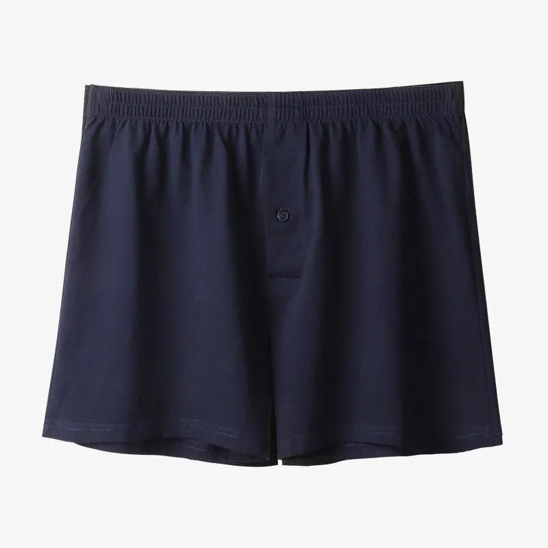 Men's light grey cotton boxer shorts with high waist and loose fitting design
