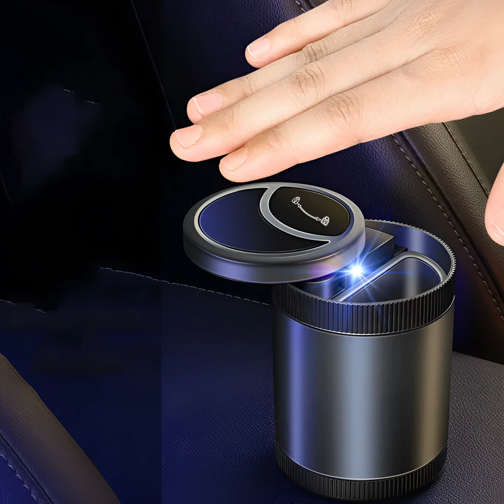 Automatic sensing ashtray in Deep Sky Grey with USB cable on car cup holder