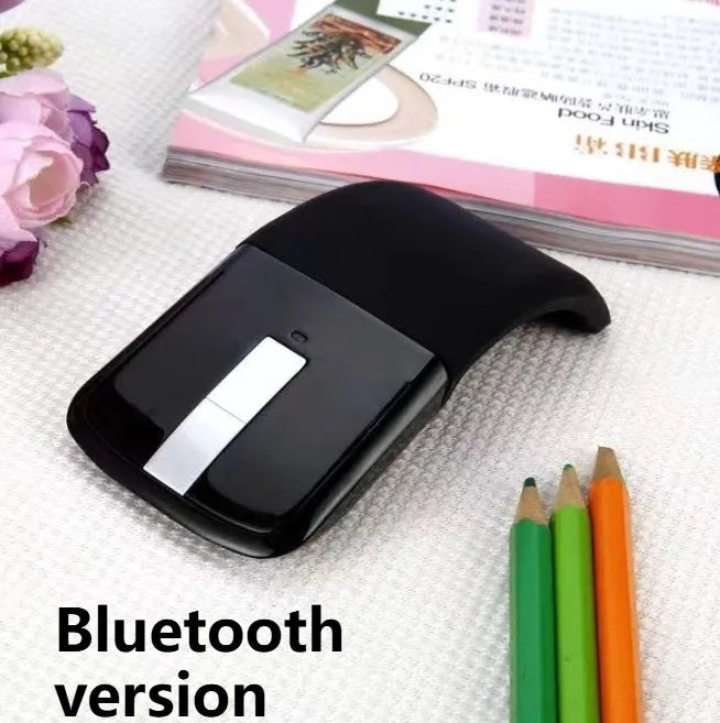 Folding wireless touch mouse shown in black colour with Bluetooth connectivity
