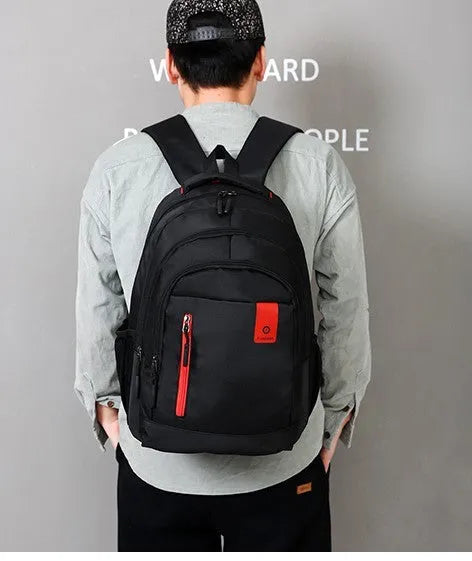 Lightweight Oxford fabric backpack for teenagers with padded straps and side pockets