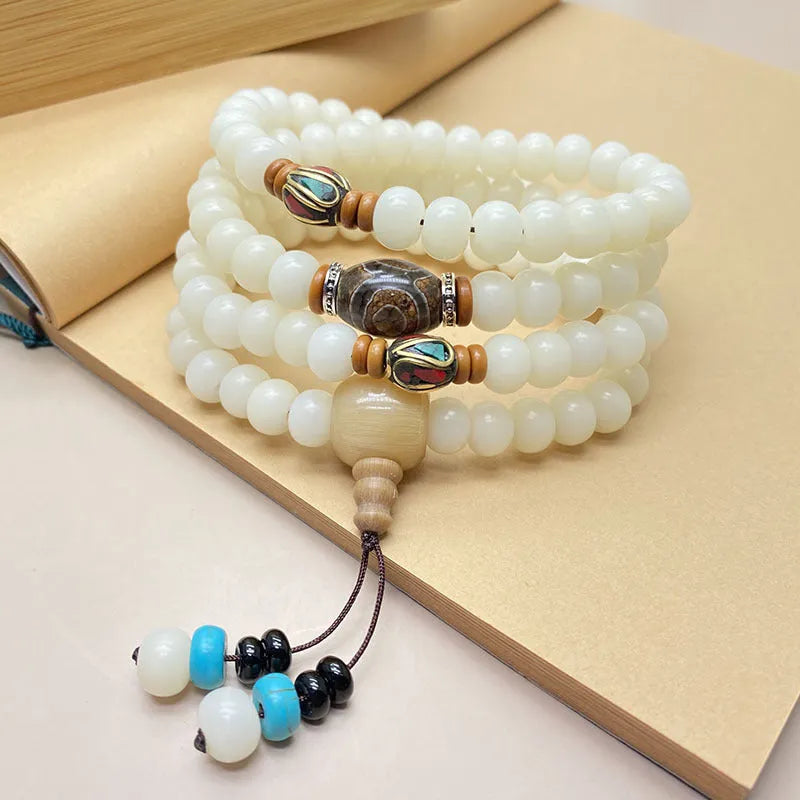 White Jade Bodhi beaded bracelet with 108 beads in unisex design, showing size and style options.
