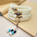 White Jade Bodhi beaded bracelet with 108 beads in unisex design, showing size and style options.