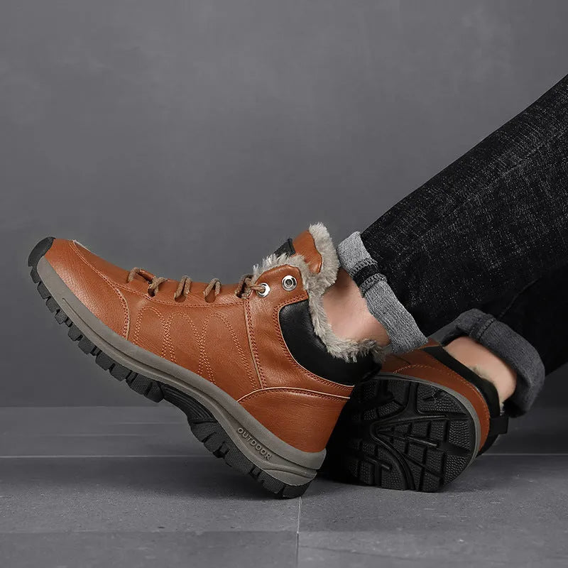 Men's black winter boots with plush lining, lace-up design, thick rubber sole, and round toe