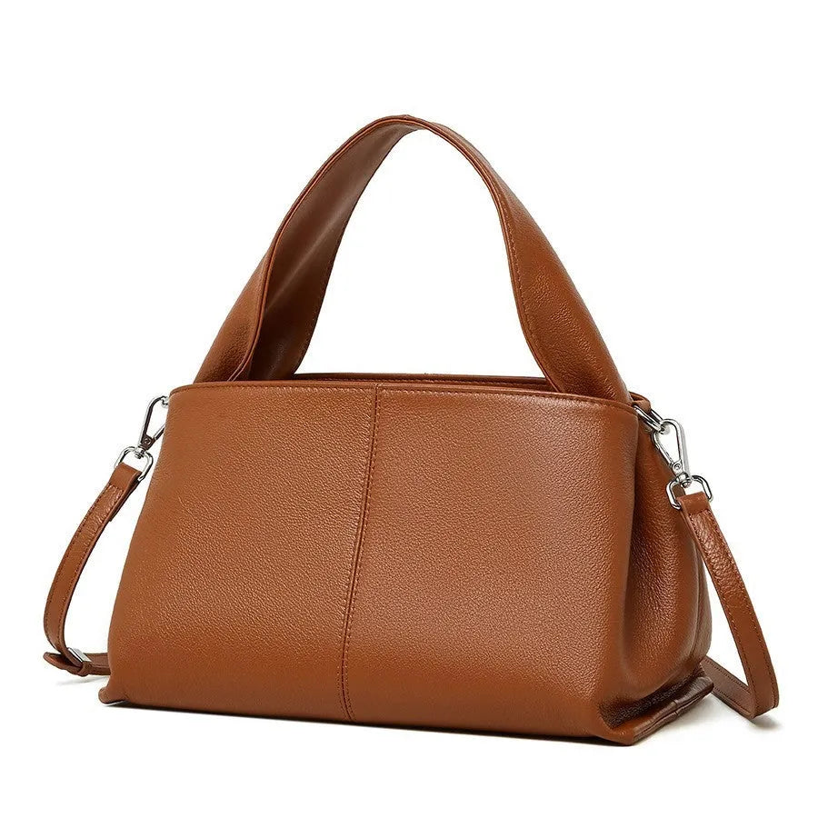 Women's cowhide messenger bag with retro texture in horizontal square shape showing double shoulder straps