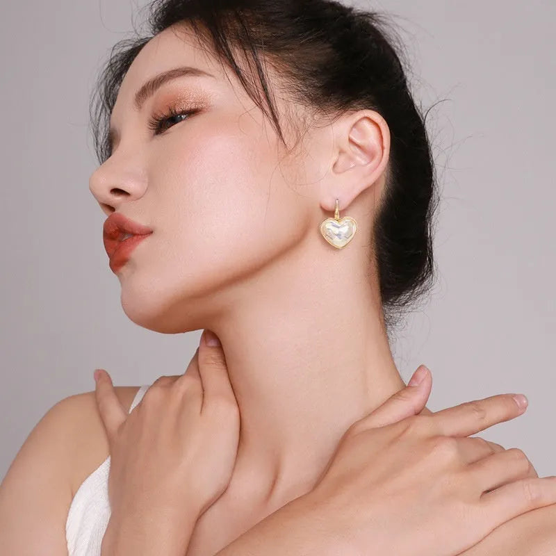 Gold coloured alloy ear clips for women with natural style and ear clip design