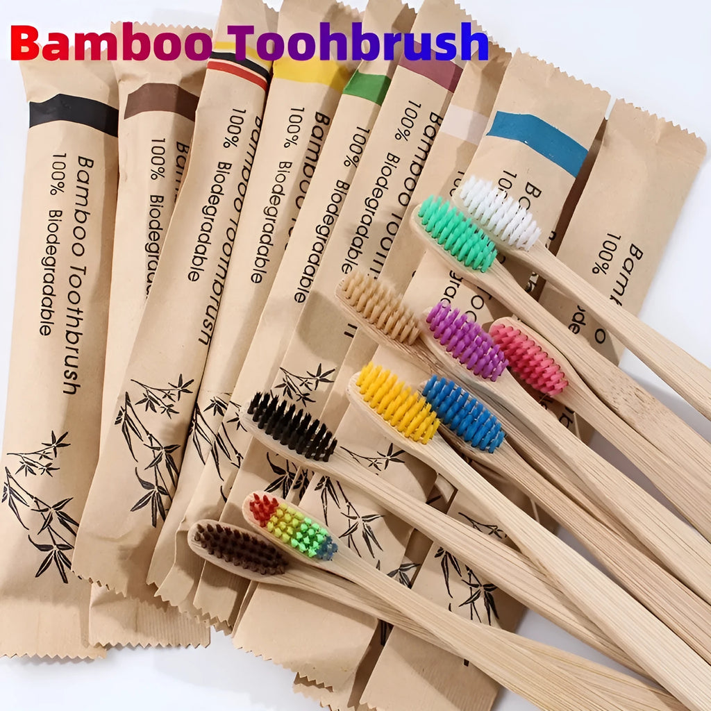 10 bamboo toothbrushes with soft charcoal bristles in assorted colours arranged fanned out