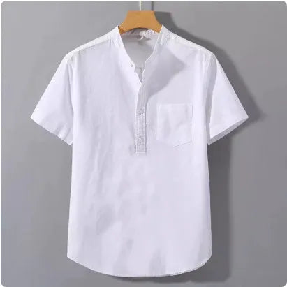 Man wearing a beige casual linen-blend shirt with a stand collar and short sleeves.