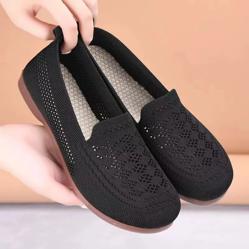 Beige antiskid walking shoes for women with breathable mesh upper and PVC sole