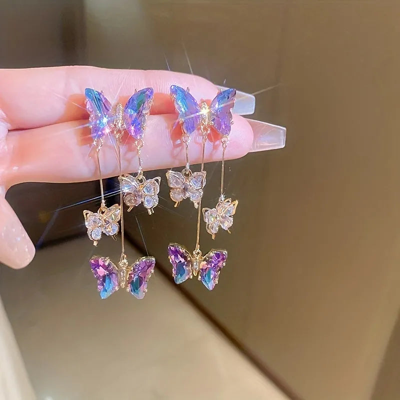 Blue purple butterfly tassel drop earrings with silver needle crystal flowers for women.