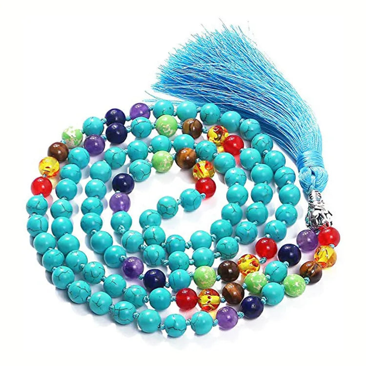 Long agate and amethyst tassel necklace with geometric beads in multiple colours on a 95-100cm chain.