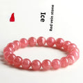 Women's red rhodochrosite crystal bracelet with geometric beads and a longevity lock clasp.