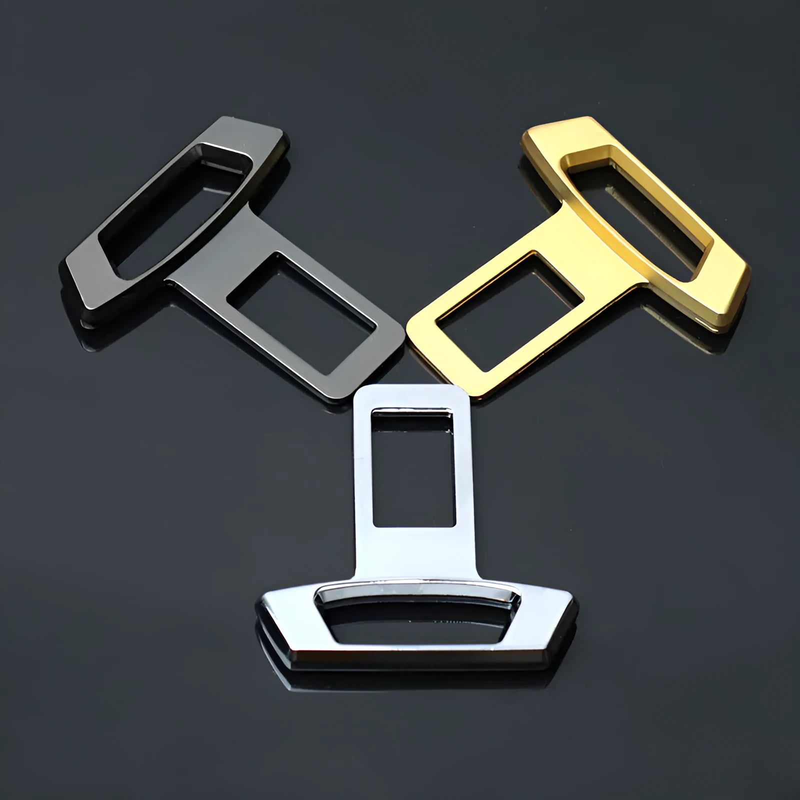 Metal car dashboard silencer insert shown in matte black, gold and silver colour options.