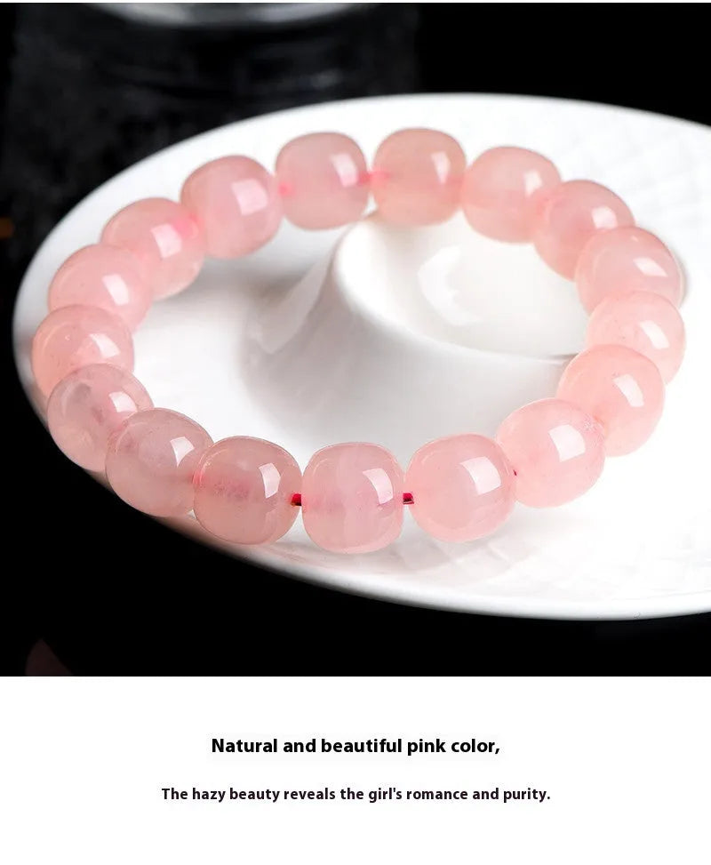 Pink natural crystal barrel bead bracelet with polished 8 x 10mm beads