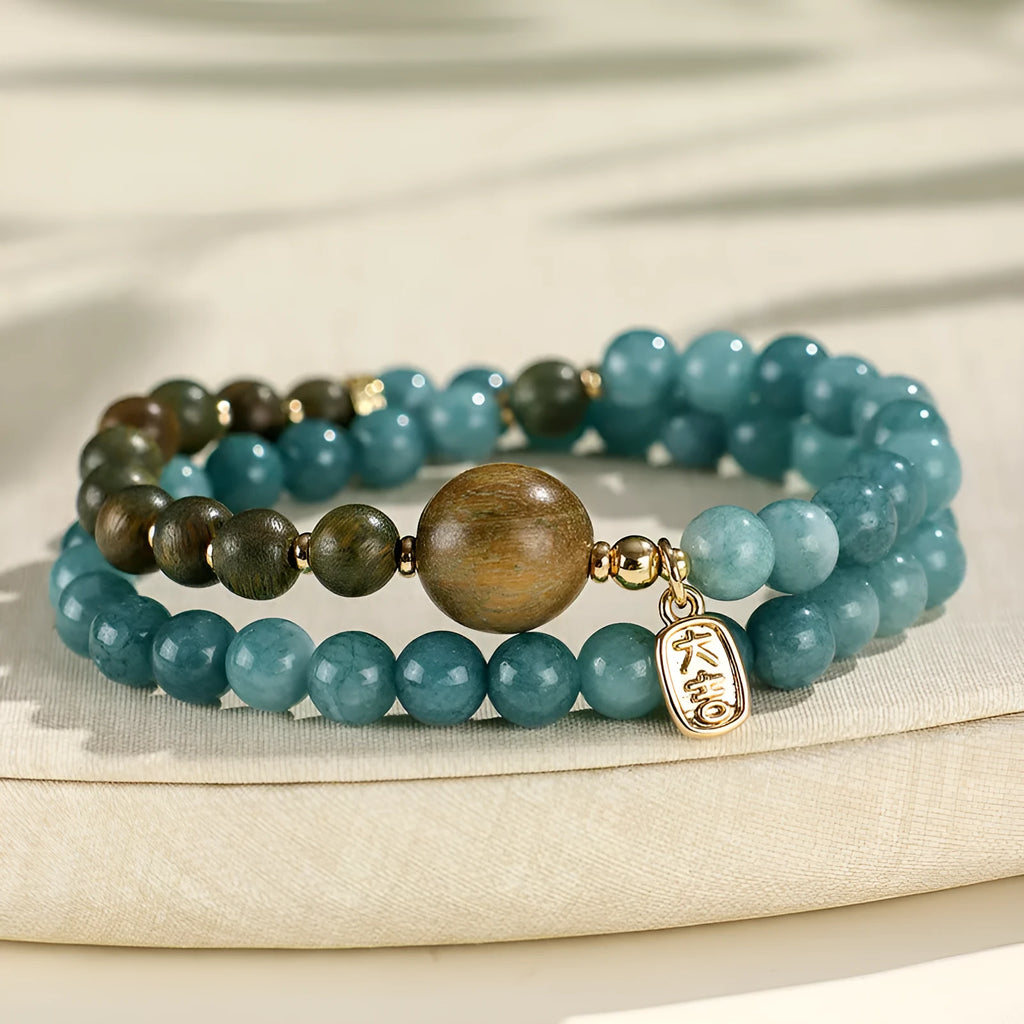 Blue gold sandalwood beaded bracelet for women with fu character charm electroplated finish