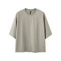 Men's short sleeve casual T-shirt in sand grey or black with loose fit pullover design