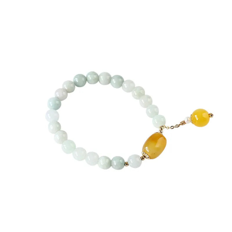 Women's bracelet with 7.5mm round agate beads and hanging tassel in 14K gilded finish