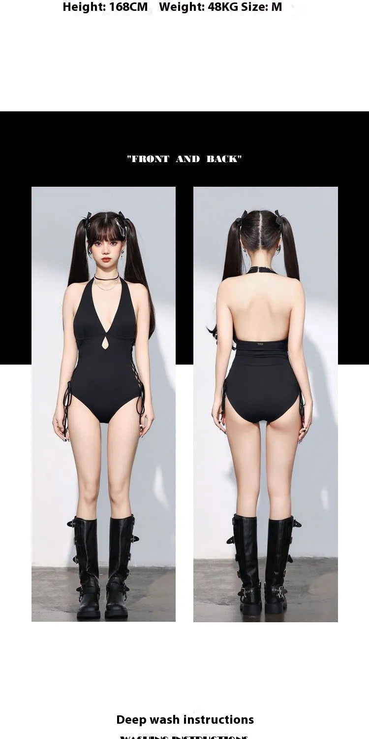 Women's V-neck hollow strap niche one-piece swimsuit in black polyester on a model