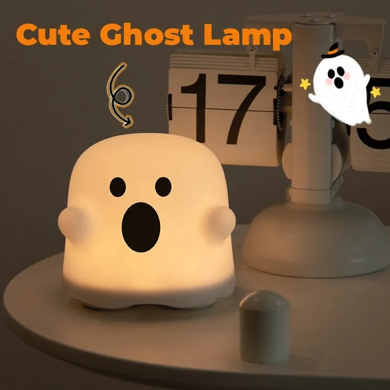 Silicone night light in Ah Ah style on a bedside table with soft glow