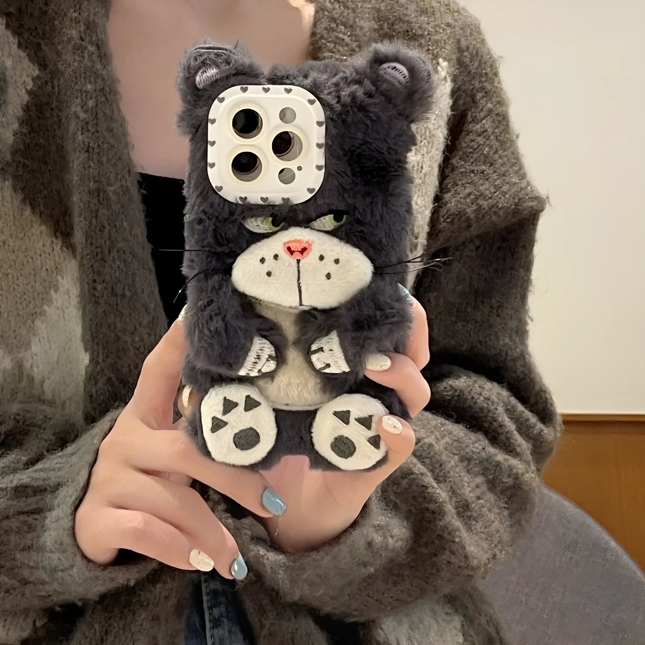 Plush staring cat phone case for iPhone with soft furry texture and love lens design