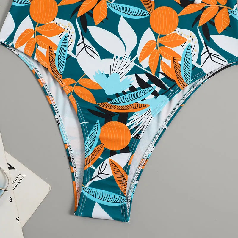 High-waist one-piece swimsuit with printed pattern in white or black colour options