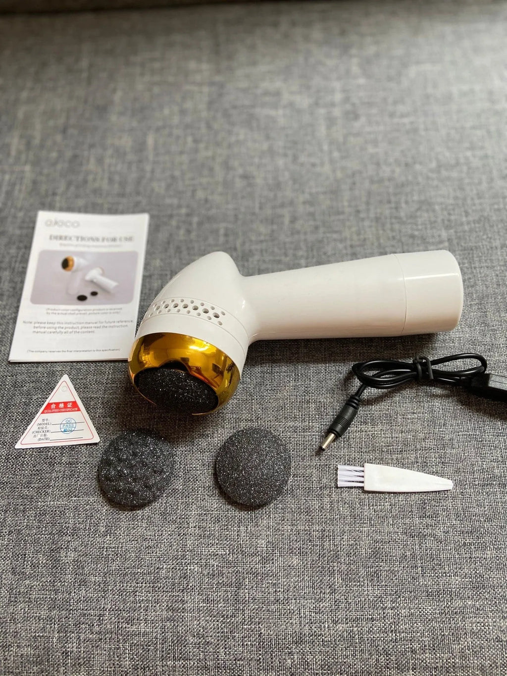 Electric vacuum foot grinder with quartz grinding head in gold finish
