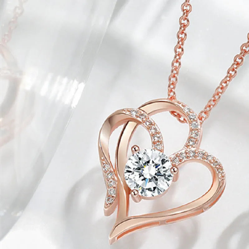 Women's heart-shaped 925 silver necklace with diamond treatment in rose gold, white gold, or yellow gold plating.