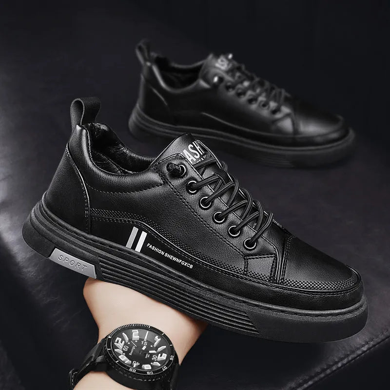Men's white low-top skate shoes with an elastic band and round toe, on a rubber sole.