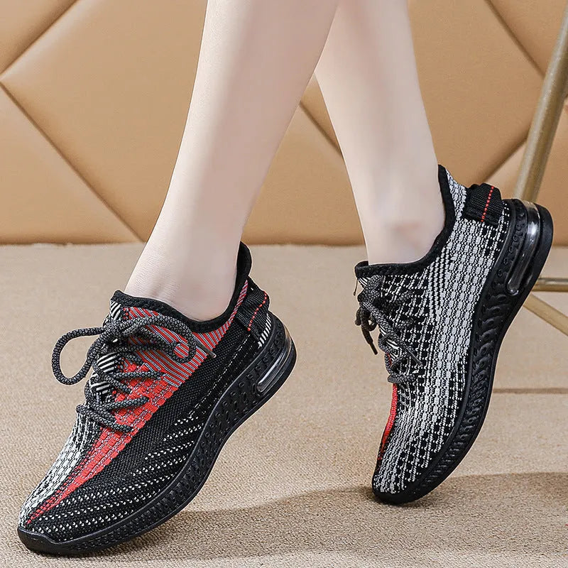 Women's lightweight breathable running shoes in purple, low-top lace-up design