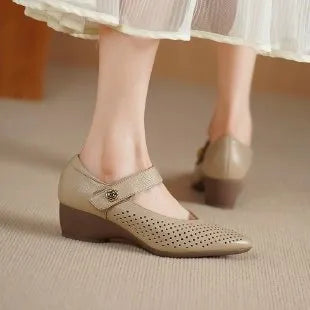 Women's black wedge high heels with pointed toe, PU upper, and hook-loop strap against a white background