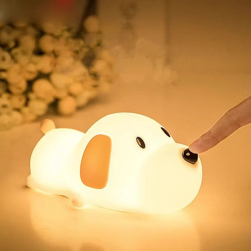 Silicone night lamp in cartoon dog shape, two-colour glow, USB charging port visible at base