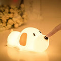 Silicone night lamp in cartoon dog shape, two-colour glow, USB charging port visible at base