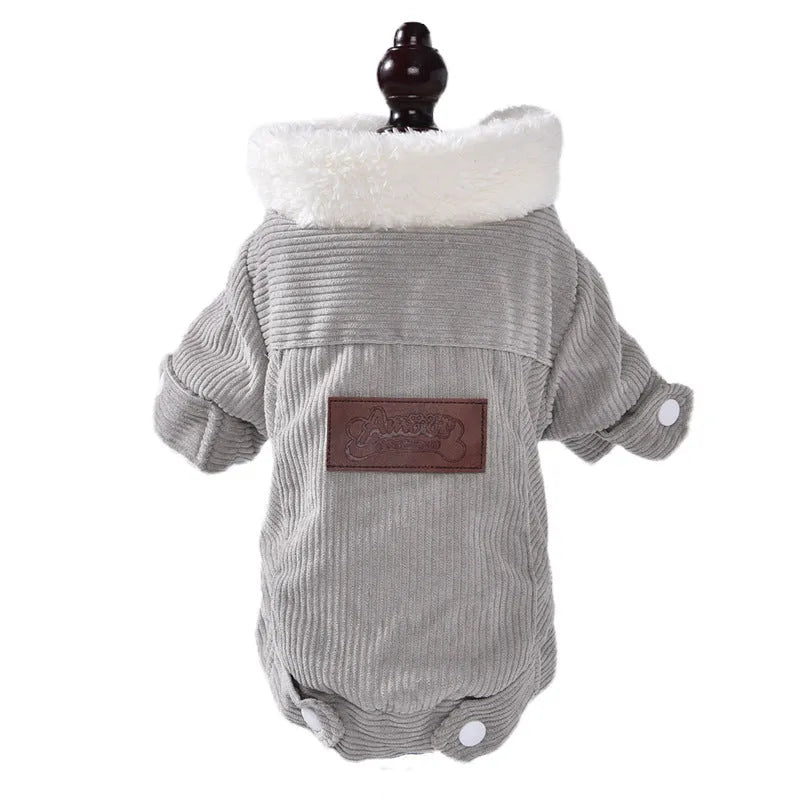 Lambswool fleece-lined dog vest in grey or pink, shown on a pet, for autumn and winter warmth.
