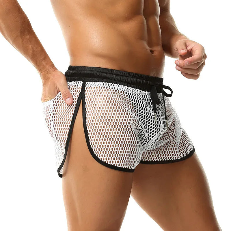 Men's loose breathable polyester boxers in solid colour black, front view on white background